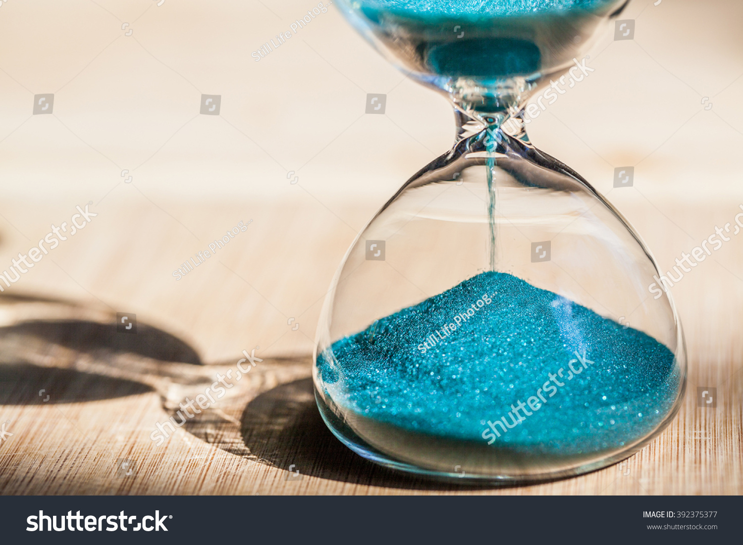 Sand Running Through The Bulbs Of An Hourglass Measuring The Passing Time In A ...1500 x 1101