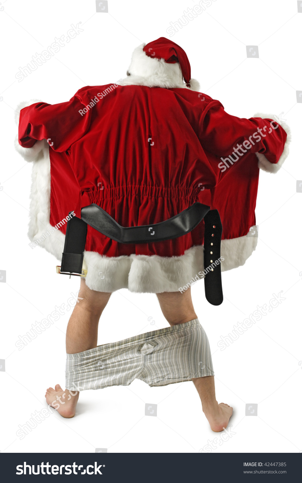 stock-photo-santa-claus-opening-his-coat