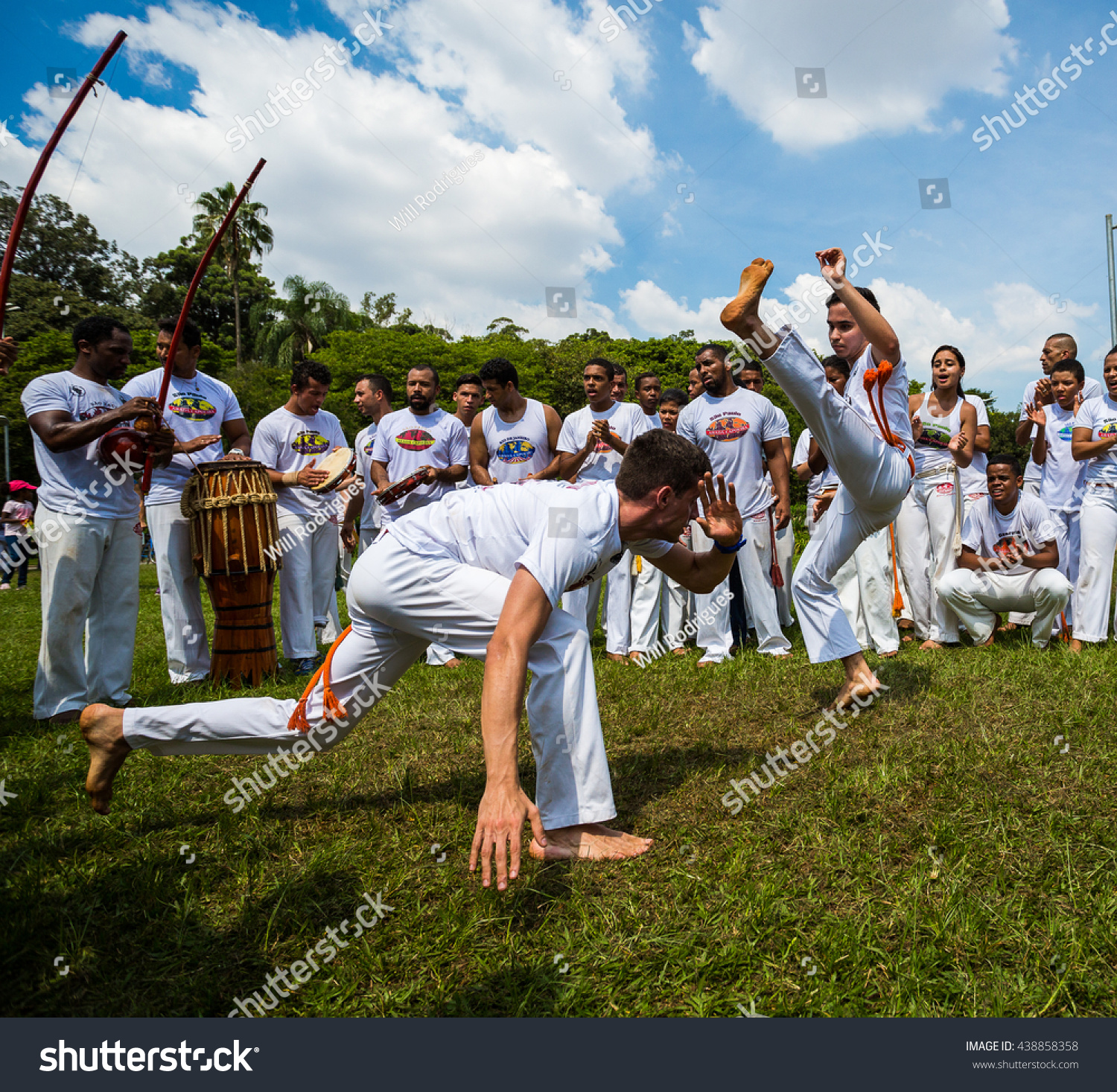 Sao Paulo Brazil 03 April 2016 Group of Brazilian capoeiristas performing at the Ibirapuera Park in Sao Paulo Brazil Sao Paulo Brazil 03 April 2016 Group of Brazilian capoeiristas performing at the Ibirapuera Park in Sao Paulo Brazil