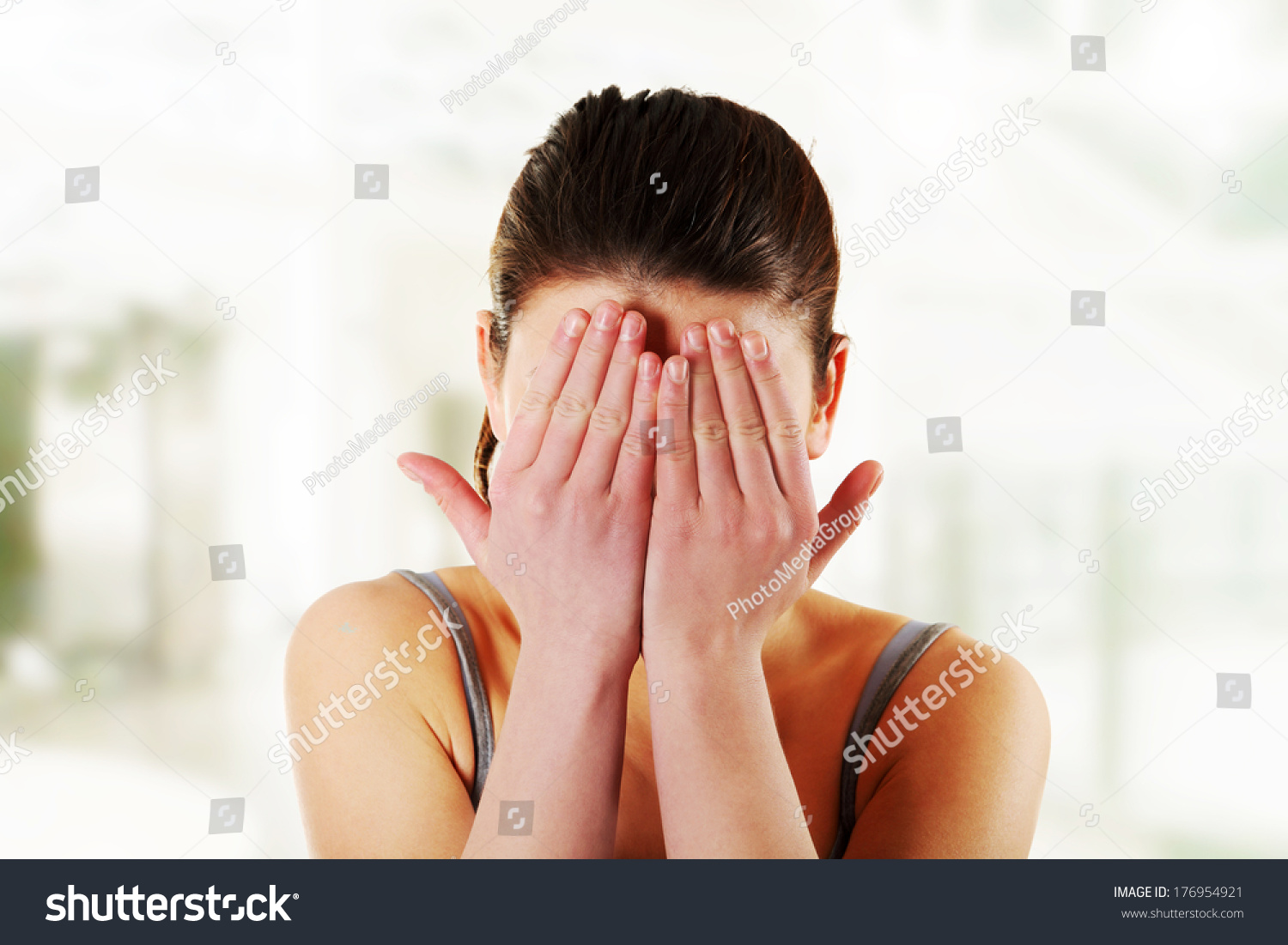 Scared Woman Hiding Her Face In Hands Stock Photo 176954921 Shutterstock