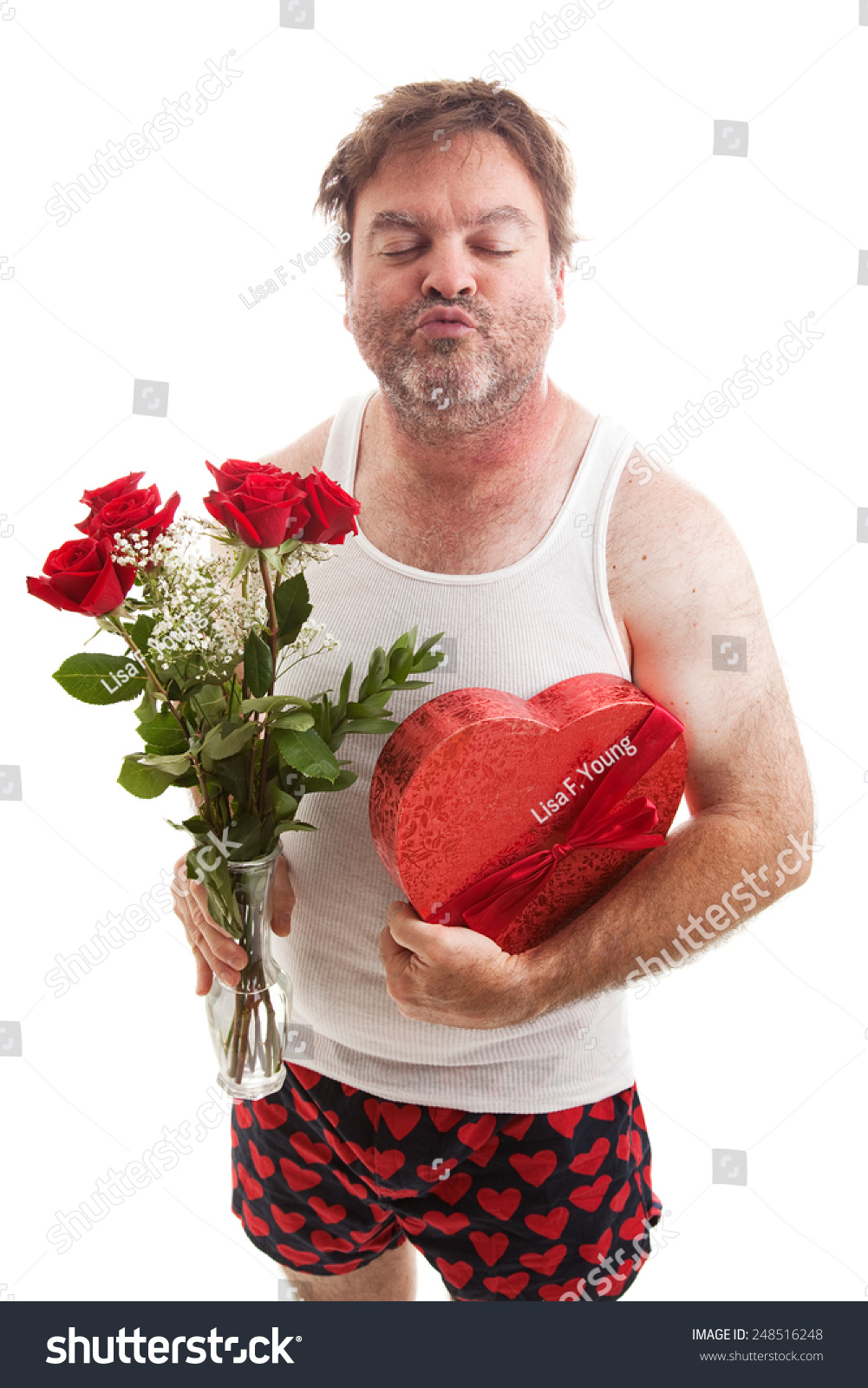 stock-photo-scruffy-middle-aged-man-in-his-underwear-with-flowers-and-candy-for-valentines-day-puckering-up-248516248.jpg