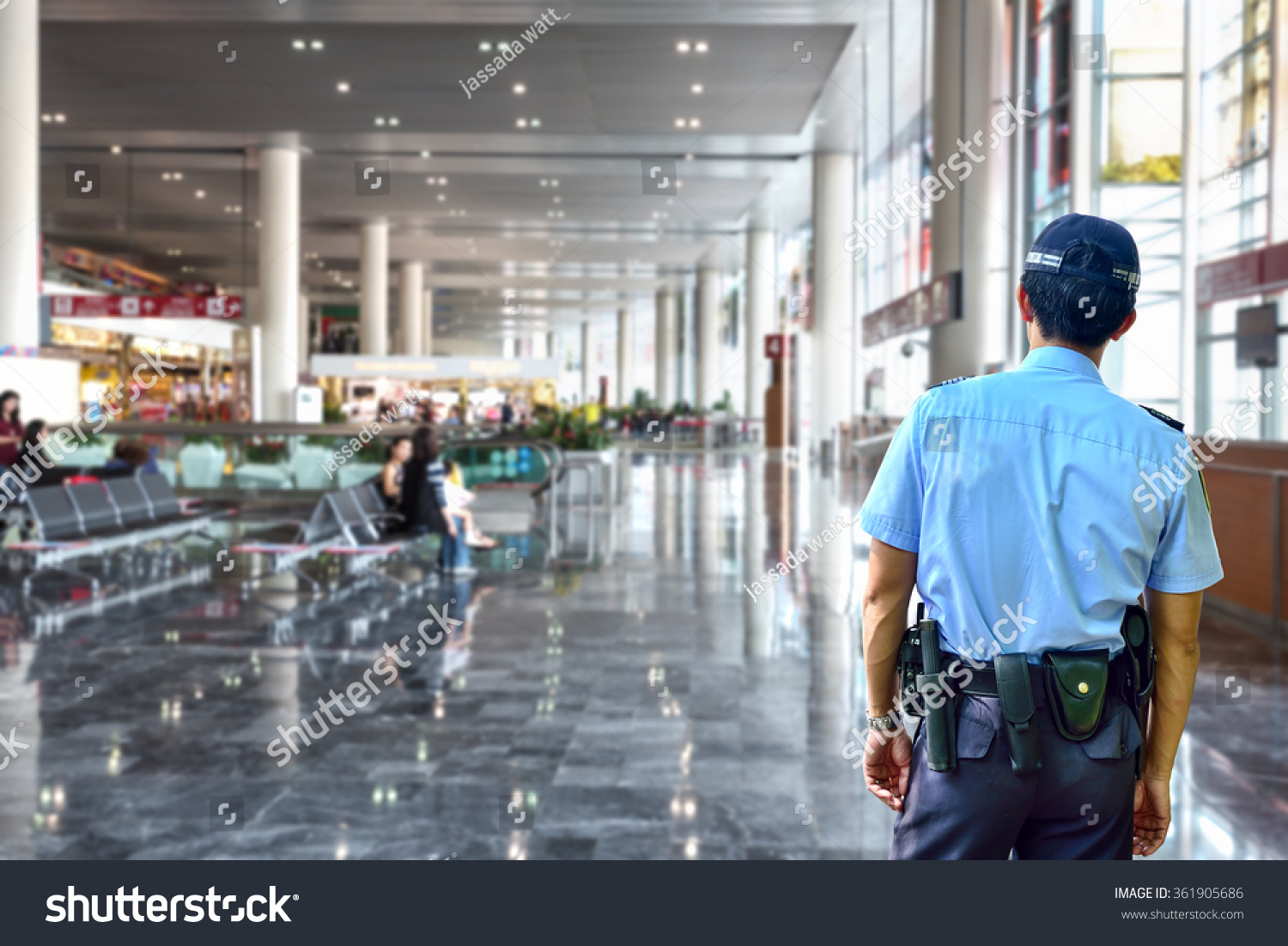 security-guard-in-airport-stock-photo-361905686-shutterstock