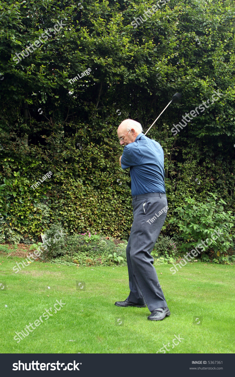 stock-photo-senior-golf-year-old-man-practicing-in-his-backyard-5367361.jpg