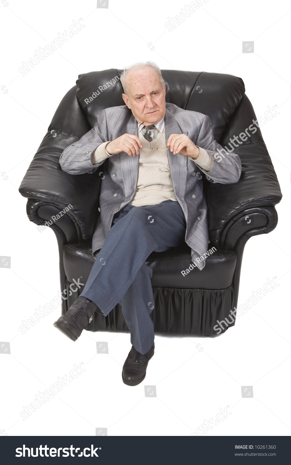 Senior Man Thinking And Sitting In An Armchair Stock Photo 10261360