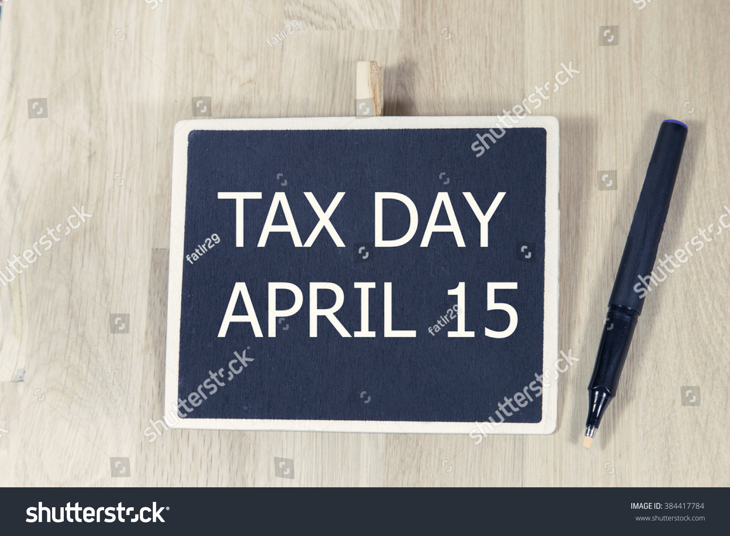 Sentence Tax Day April 15 Written With Chalk On A Blackboard On A