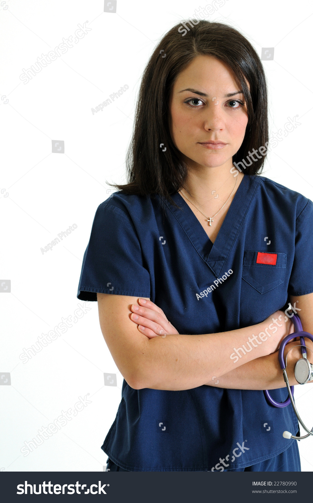 Serious Nurse Dark Blue Scrubs Standing With Arms Folded Holding Stethoscope Close Crop Stock 5747