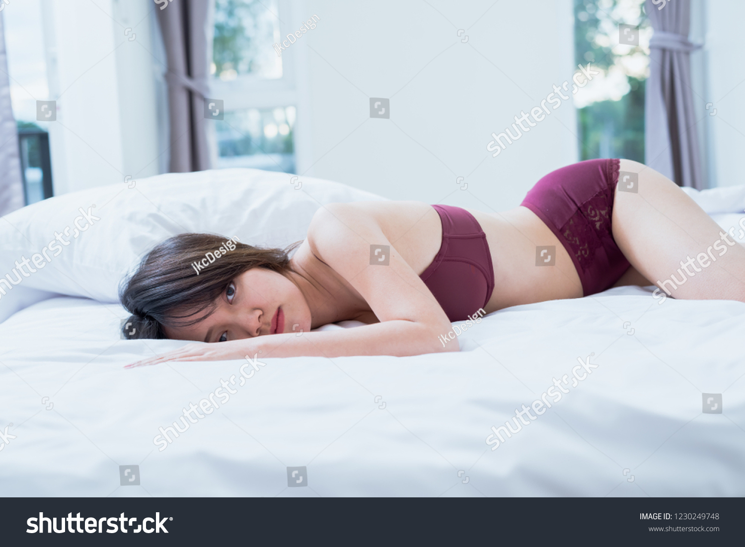 Sexy Asian Woman Lingerie Lying On Shutterstock