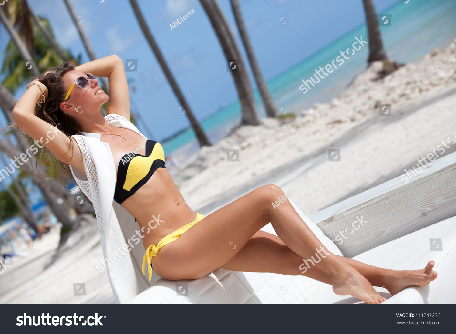 Sexy Bikini Tan Woman Relaxing On Stock Photo 411742276 Shutterstock