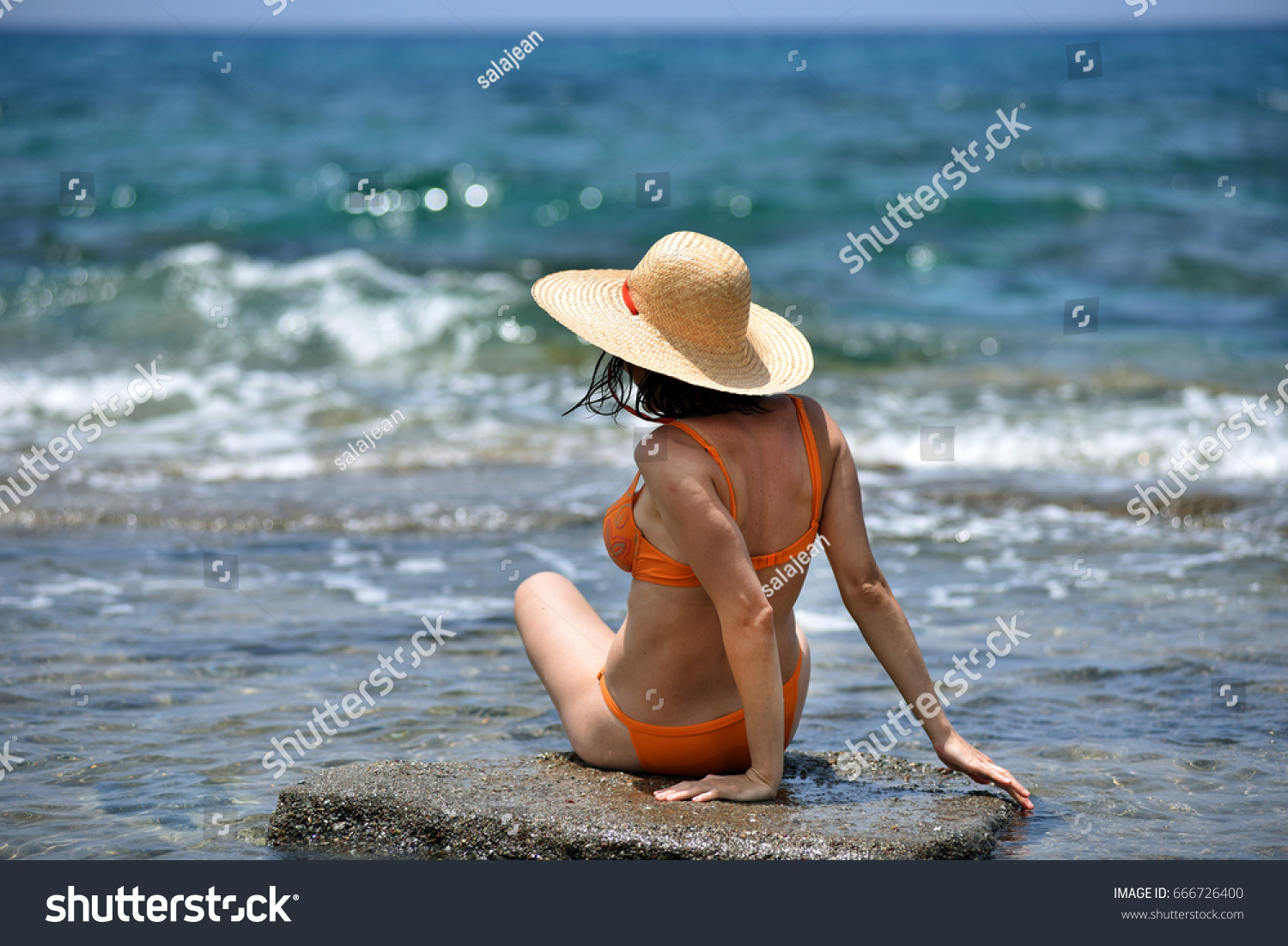 Sexy Bikini Tanning Woman Relaxing On Shutterstock