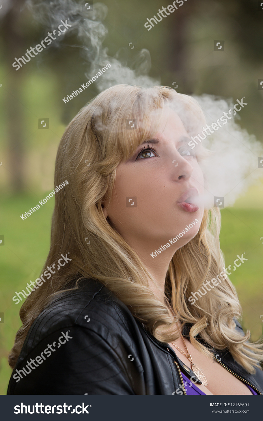 Sexy Blonde Big Breasts Smokes Hookah Shutterstock