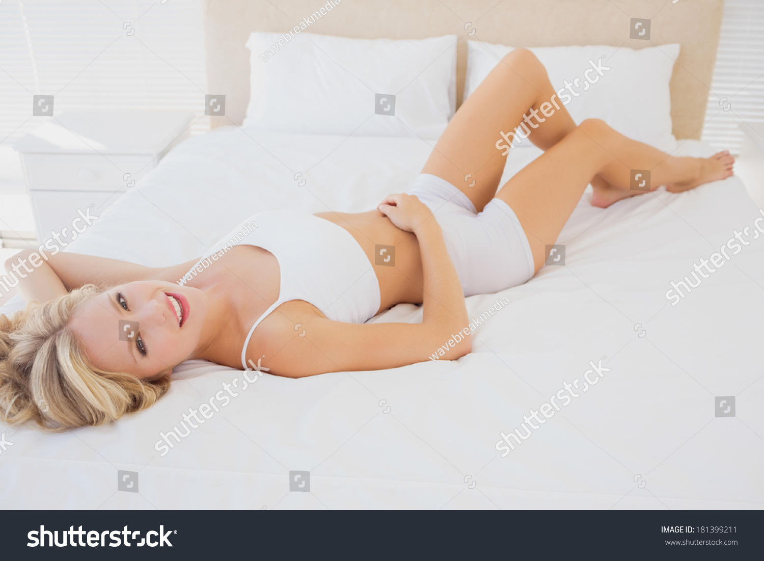 Sexy Blonde Woman Relaxing On Bed Stock Photo 181399211 Shutterstock