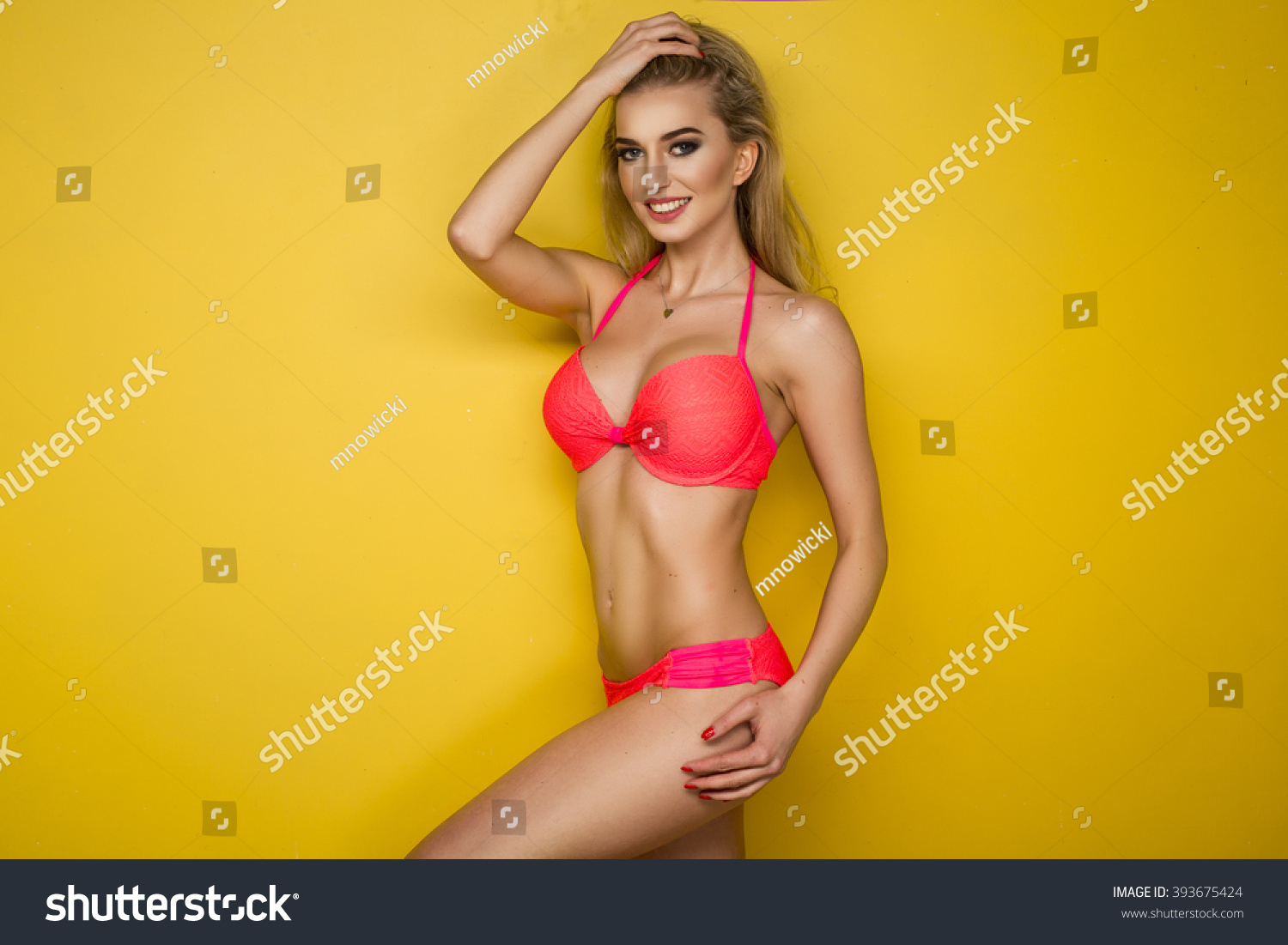 Sexy Blonde Woman Wearing Pink Swimwear Stock Photo 393675424