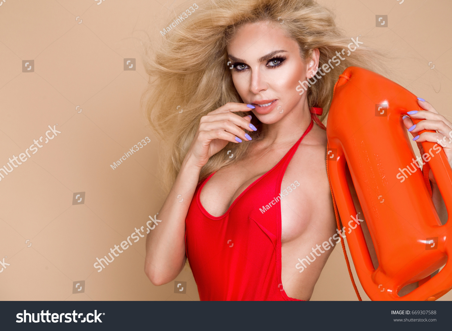 Sexy Busty Blonde Lifeguard Woman Red Stock Photo 669307588 Shutterstock