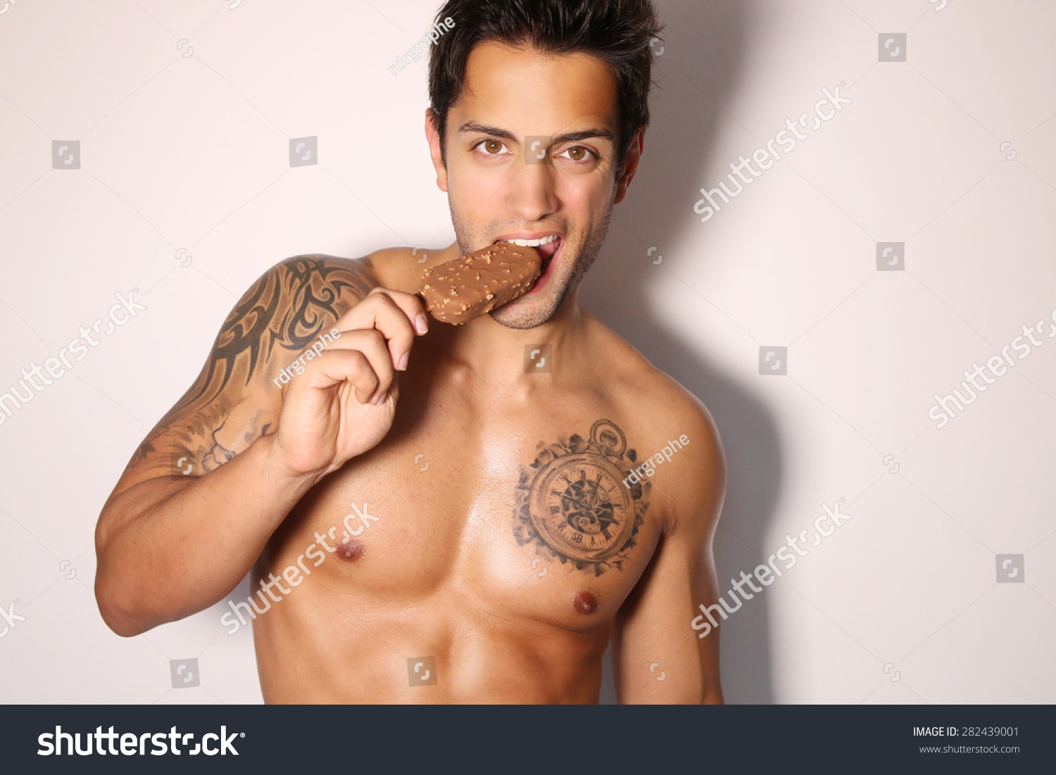 stock-photo-sexy-man-eating-ice-cream-282439001.jpg