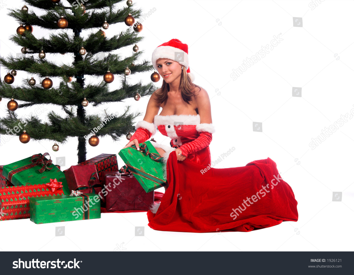 Sexy Ms Santa Claus Unloading Christmas Ts From Santa S Bag And