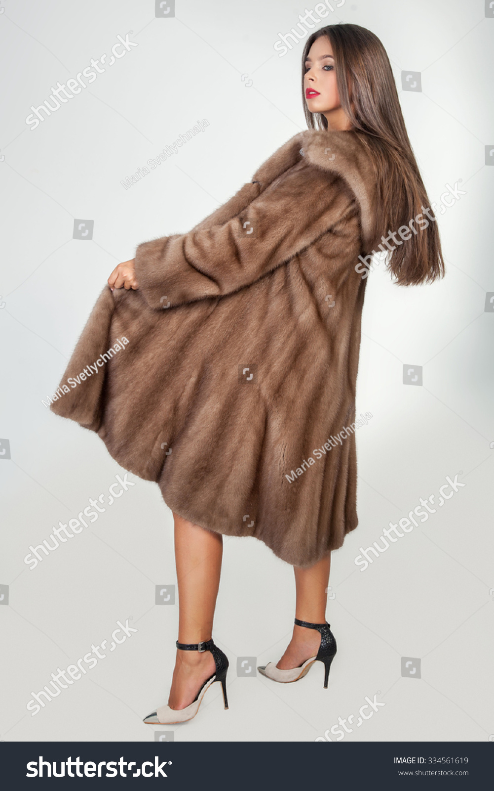 naked woman with fur coat boss forces guy to lick pussy