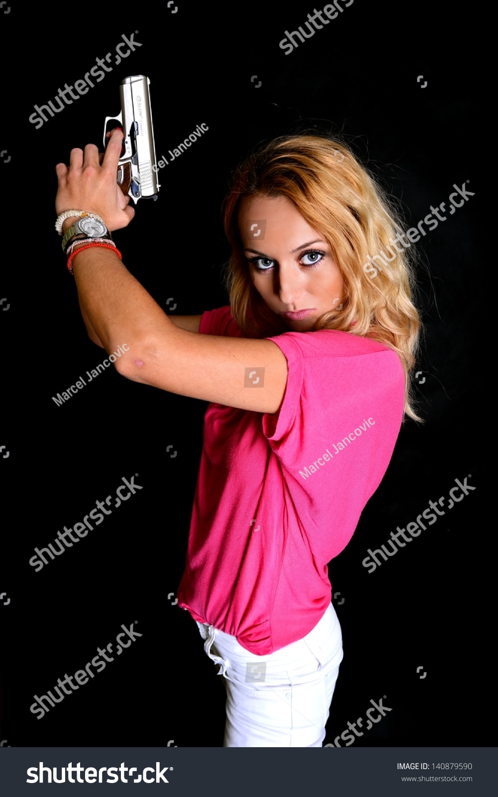 Sexy Woman Holding Gun Stock Photo 140879590 Shutterstock