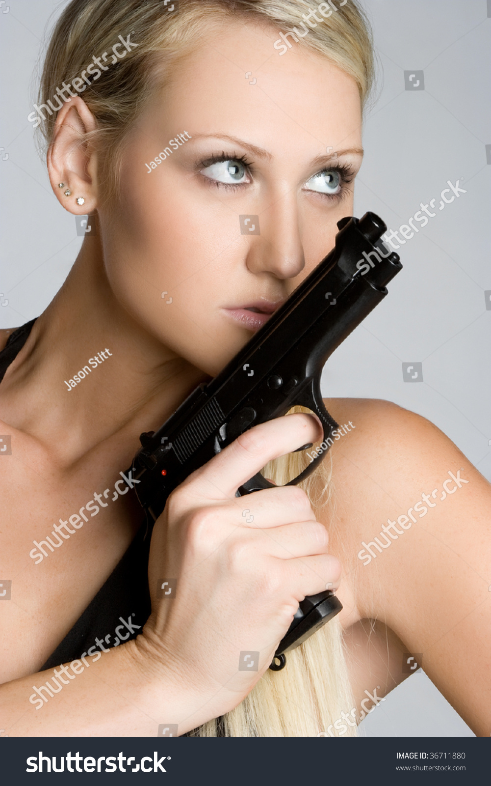 Sexy Woman Holding Gun Stock Photo 36711880 Shutterstock