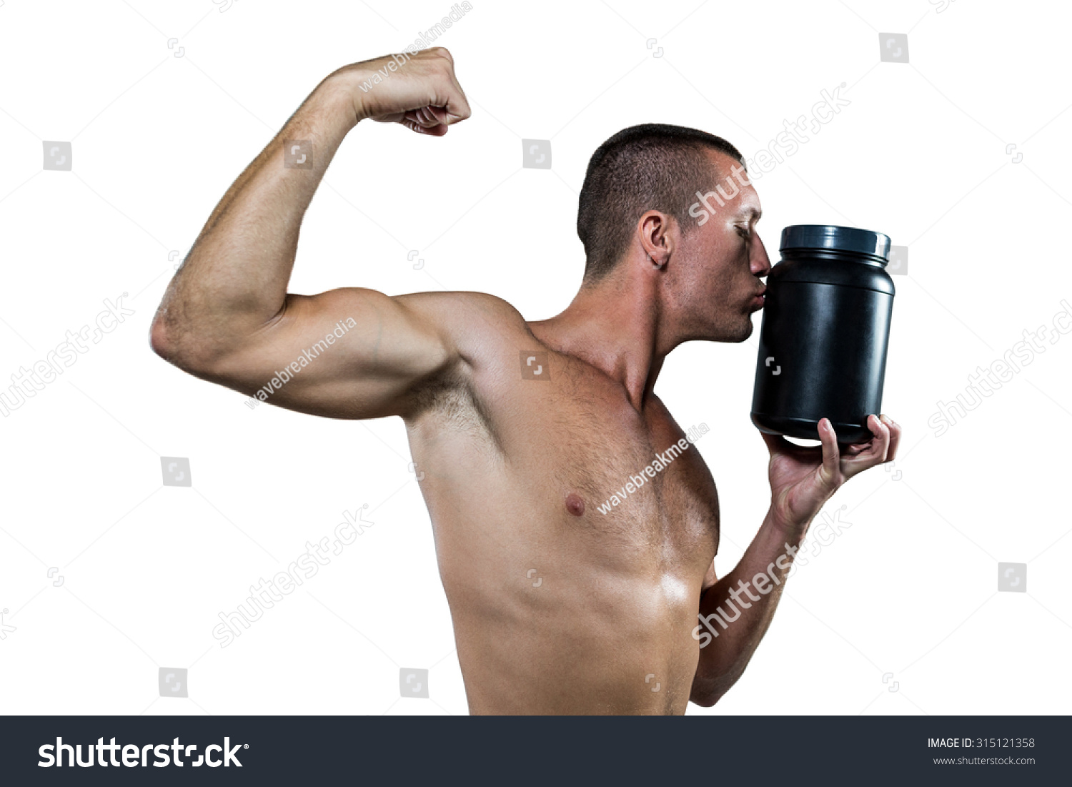 Shirtless Athlete Flexing Muscles While