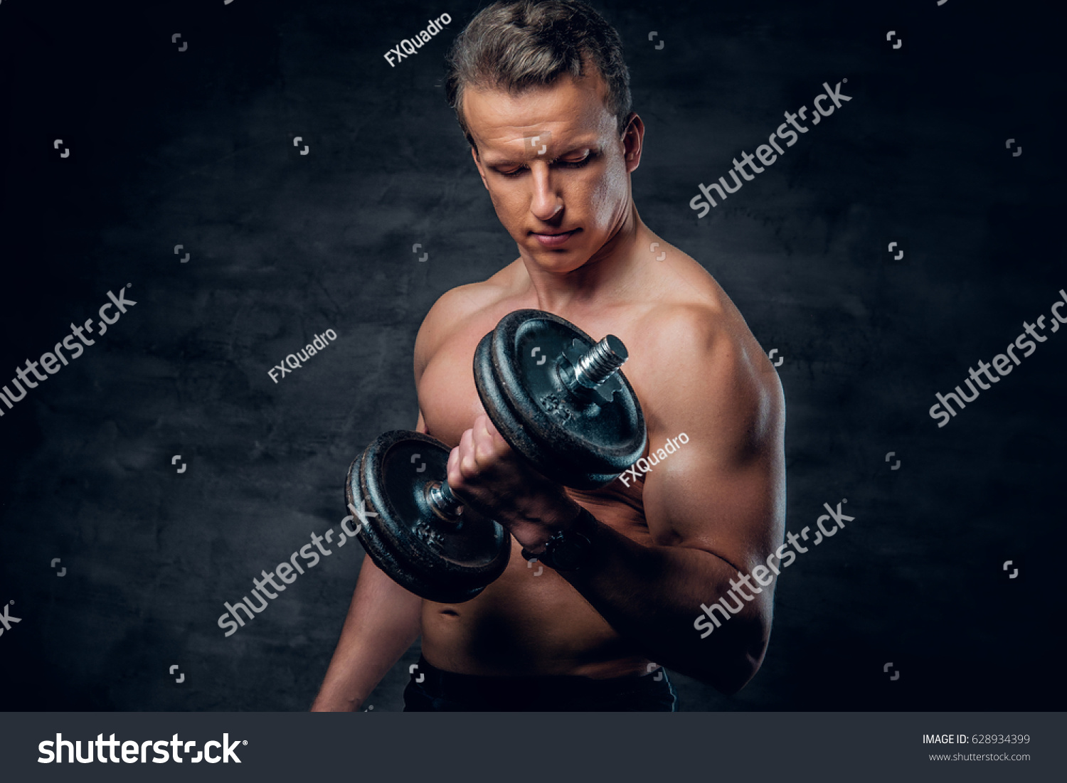 Shirtless Athletic Male Doing Biceps Exercise Stock Photo 628934399