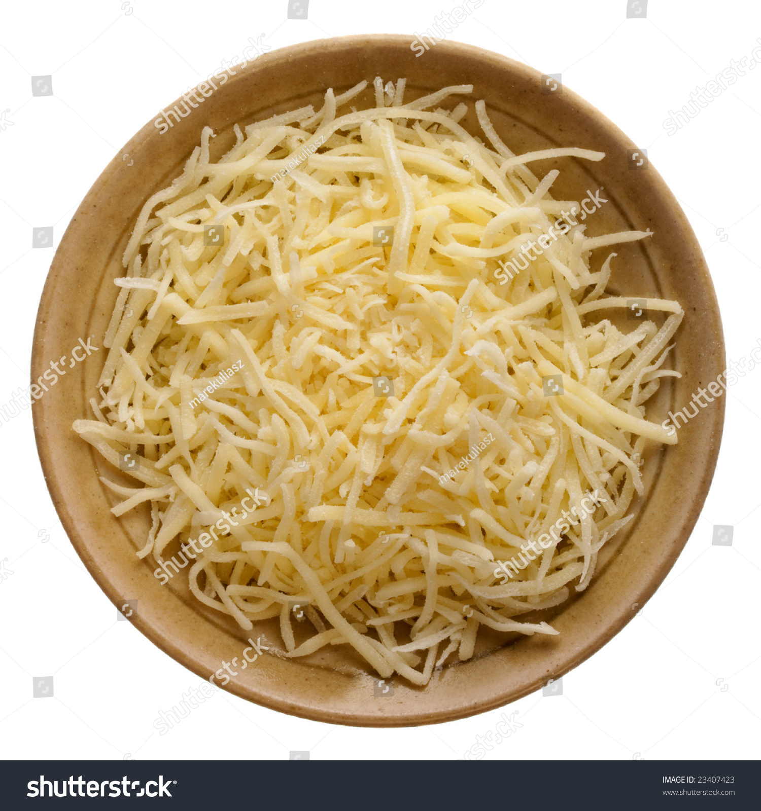 Shredded Mild Cheddar Cheese On A Small Ceramic Bowl Isolated Against ...