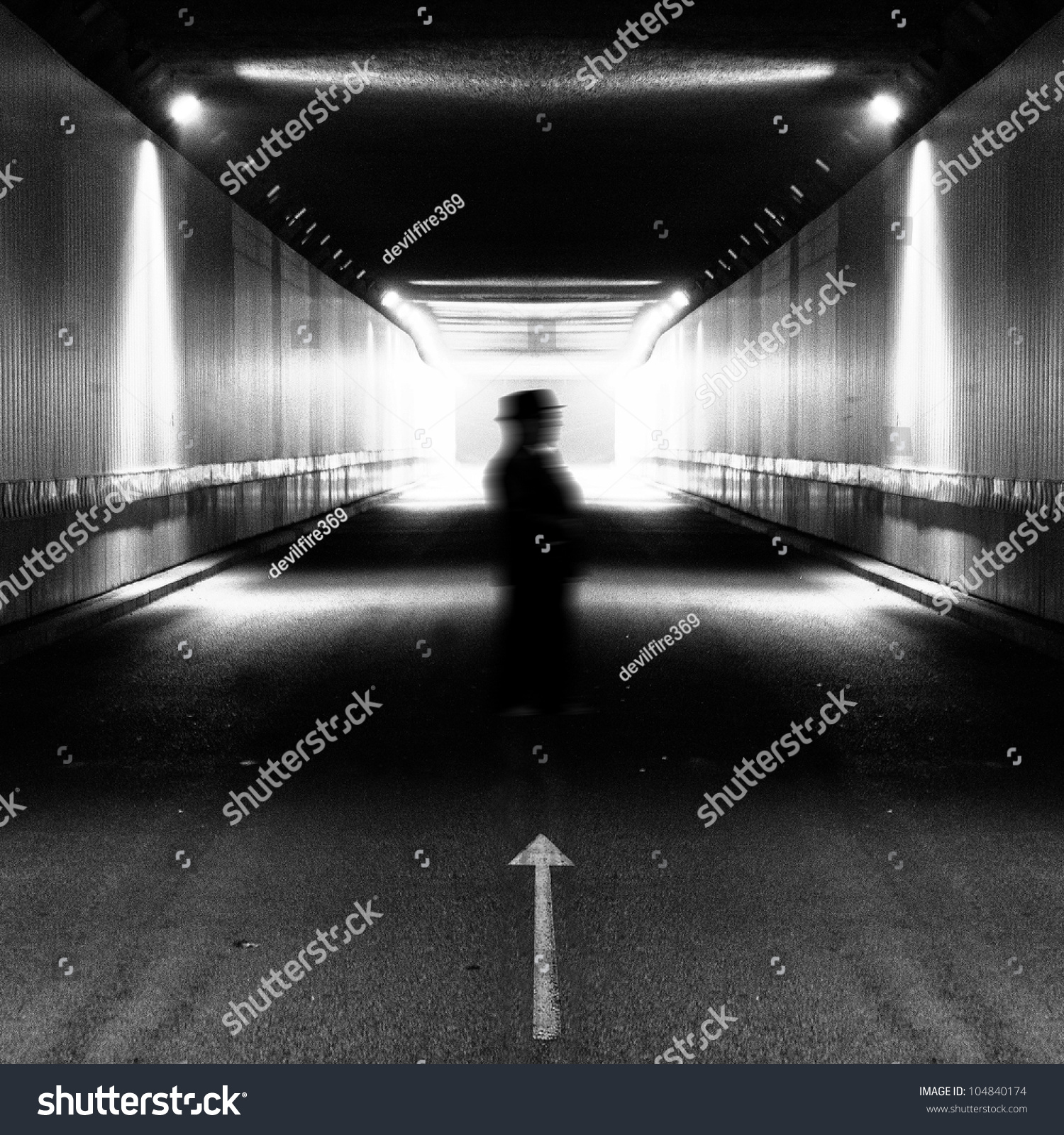 Silhouette Man Walking In Light Tunnel Stock Photo ...
 Silhouette Man Walking Tunnel