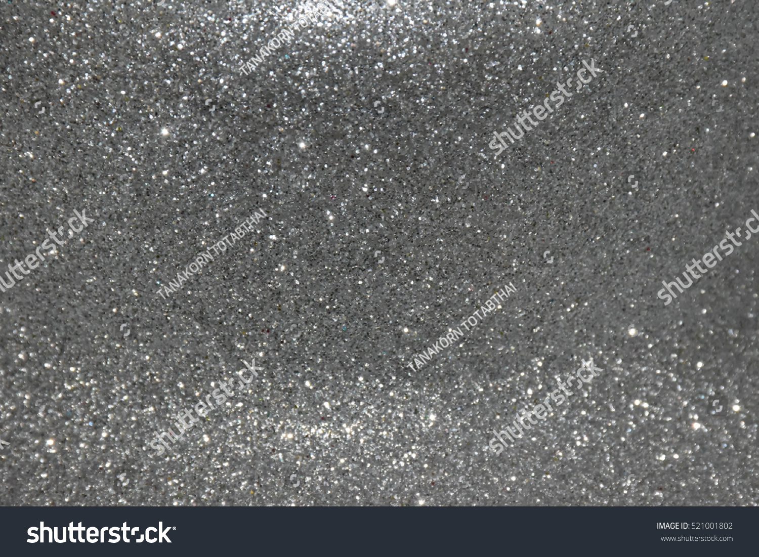 Silver glitter background black bokeh abstract Christmas Silver glitter background black bokeh abstract Christmas