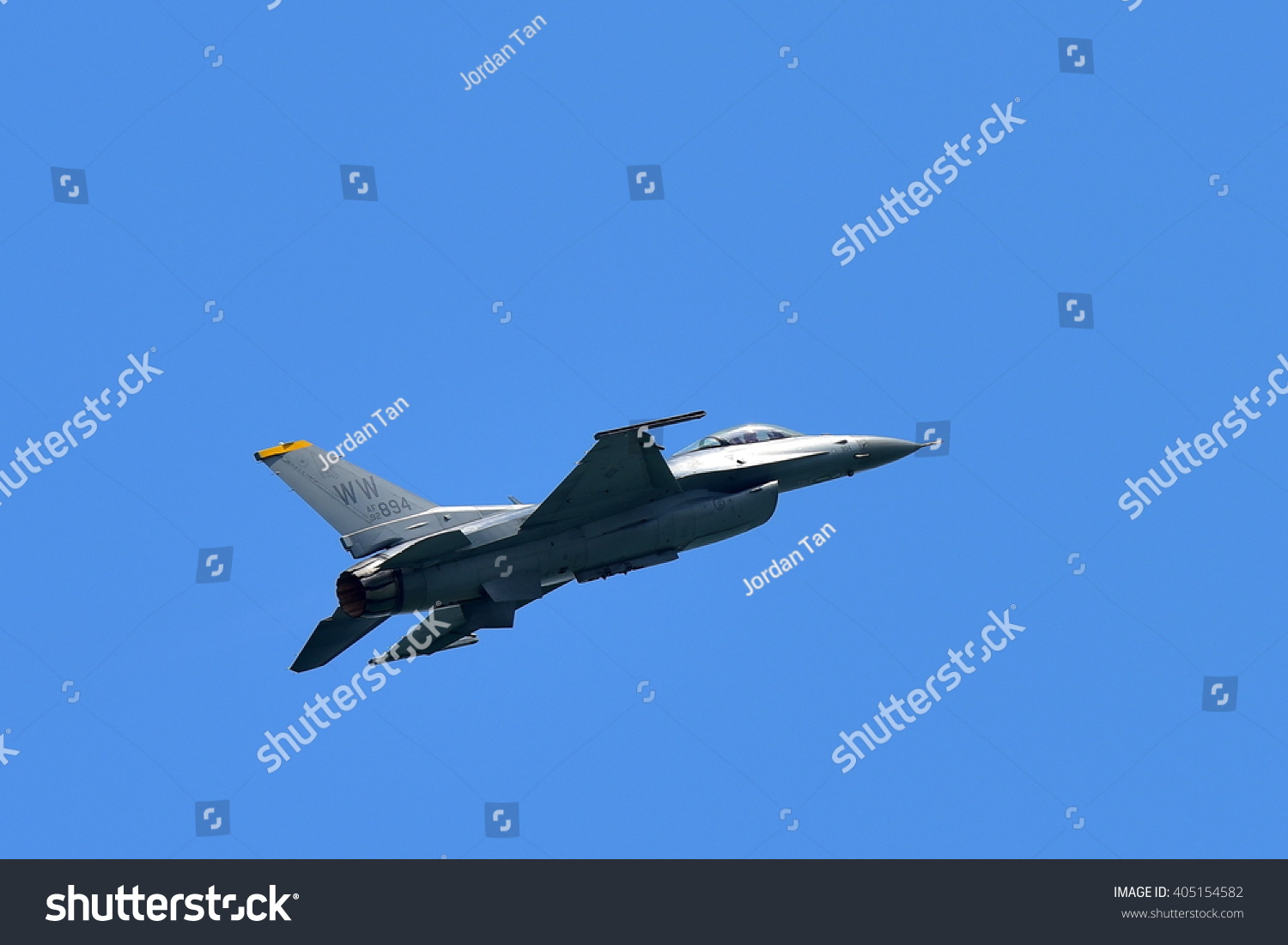 SINGAPORE FEBRUARY 16 USAF F-16C D Fighting Falcon performing aerial display at Singapore Airshow February 16 2016 in Singapore SINGAPORE FEBRUARY 16 USAF F-16C D Fighting Falcon performing aerial display at Singapore Airshow February 16 2016 in Singapore