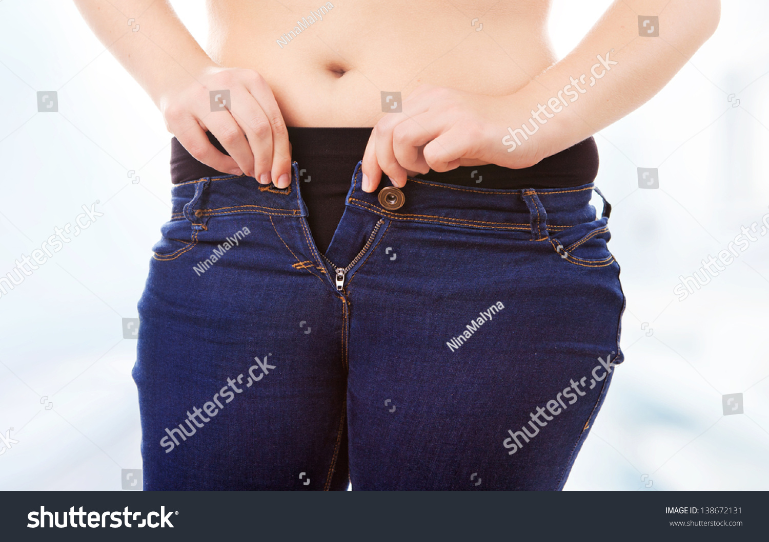 Size 40/42 Woman Zipping Tight Jeans, Obesity And Overweight Concept ...