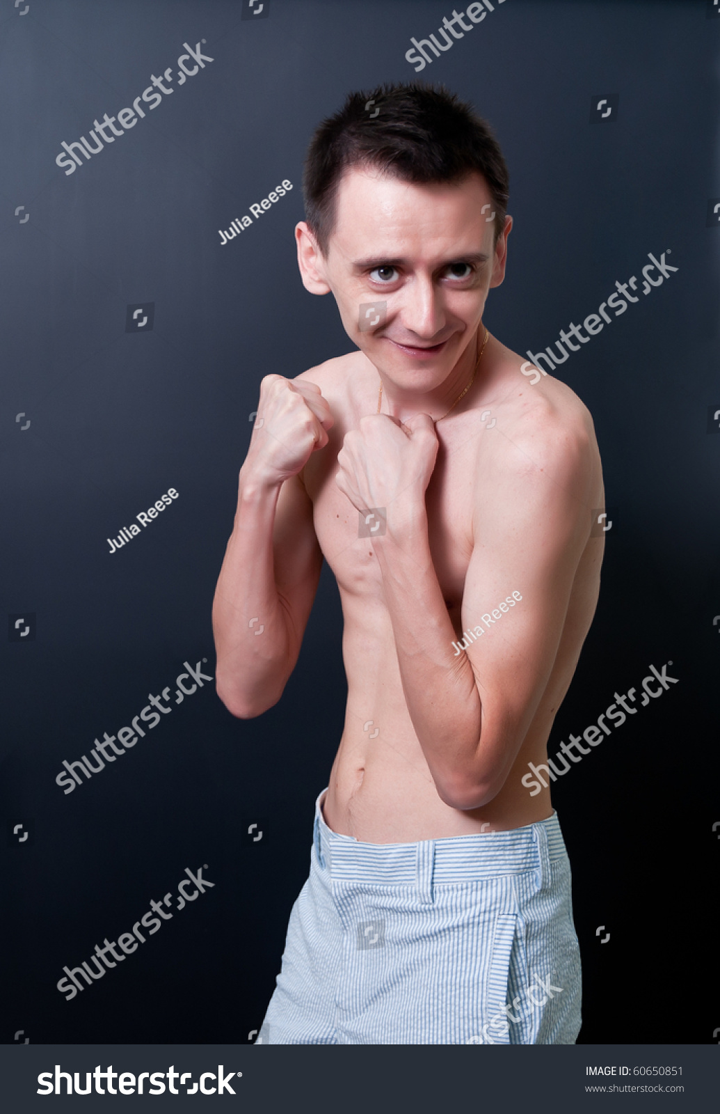 Skinny Topless Man Showing His Muscles Stock Photo 60650851 Shutterstock