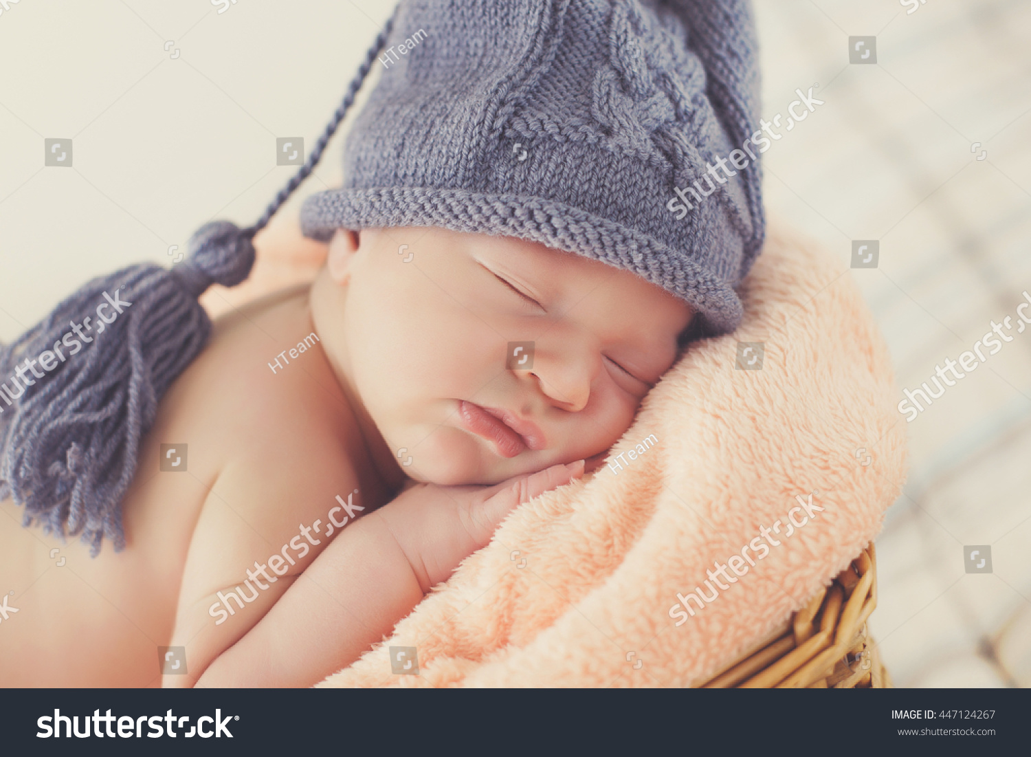 sleeping newborn baby Sleeping newborn baby on fur with knitted hat baby girl or baby boy sleeping newborn baby Sleeping newborn baby on fur with knitted hat baby girl or baby boy