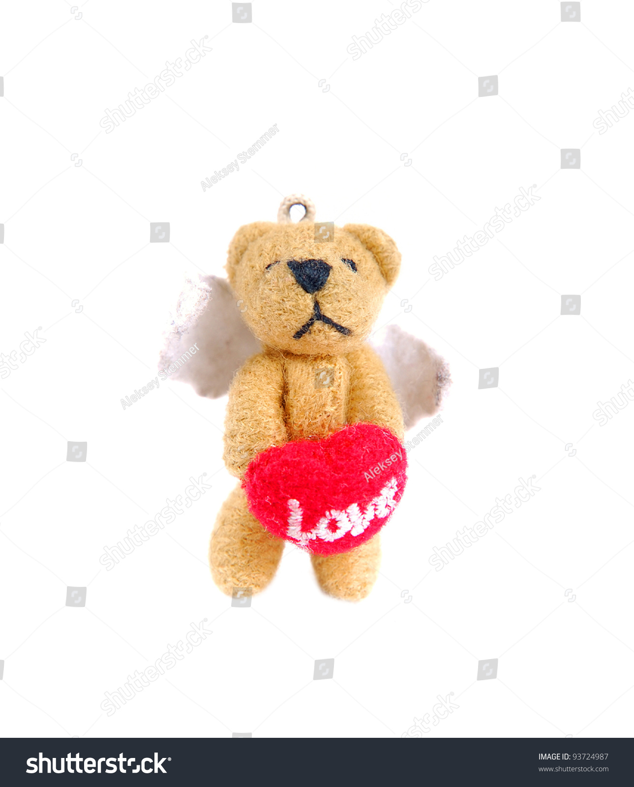 small teddy bear holding heart