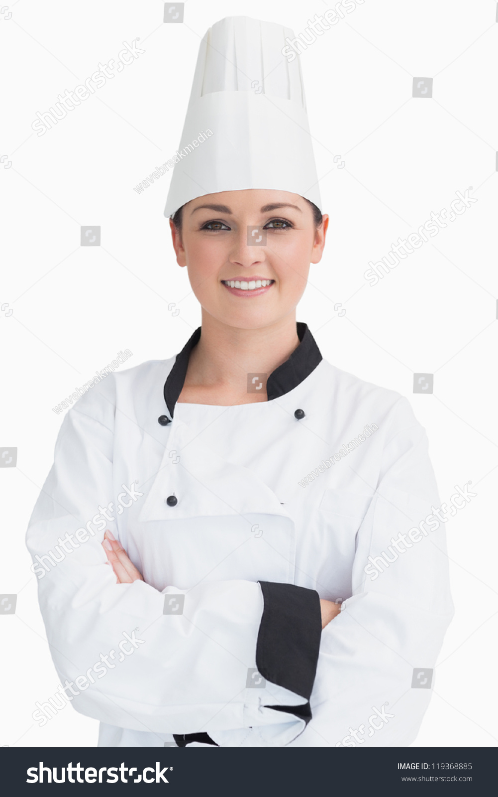 Smiling And Standing Cook Wearing A Chef Hat In Front Of Camera Stock 