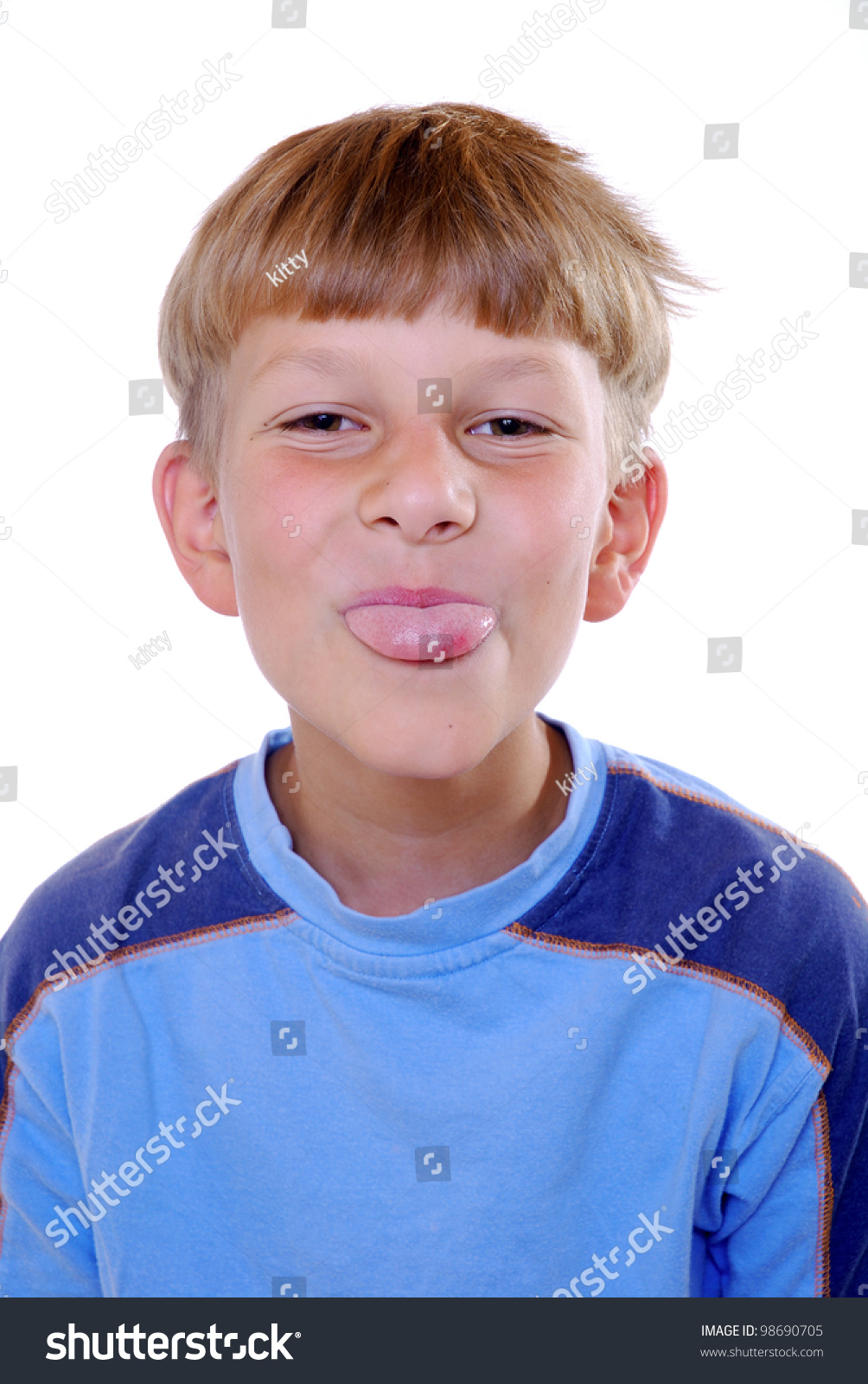 smiling-boy-sticks-his-tongue-out-stock-photo-98690705-shutterstock