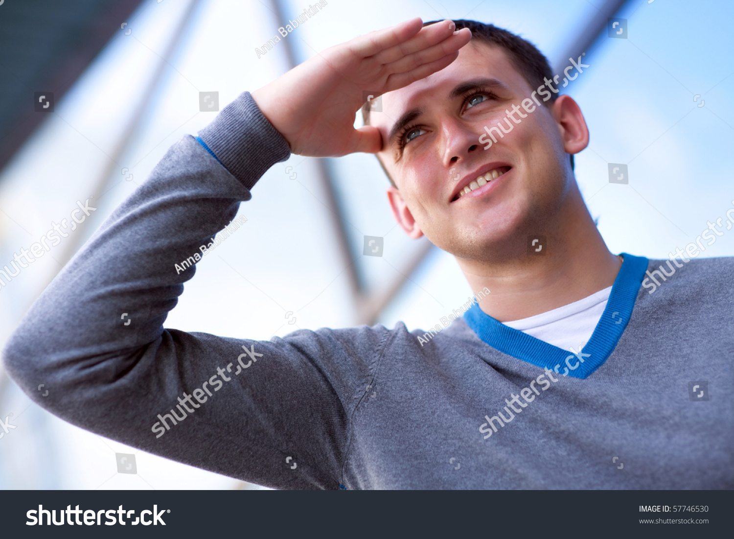 Smiling Young Man Looking Into Future Stock Photo 57746530