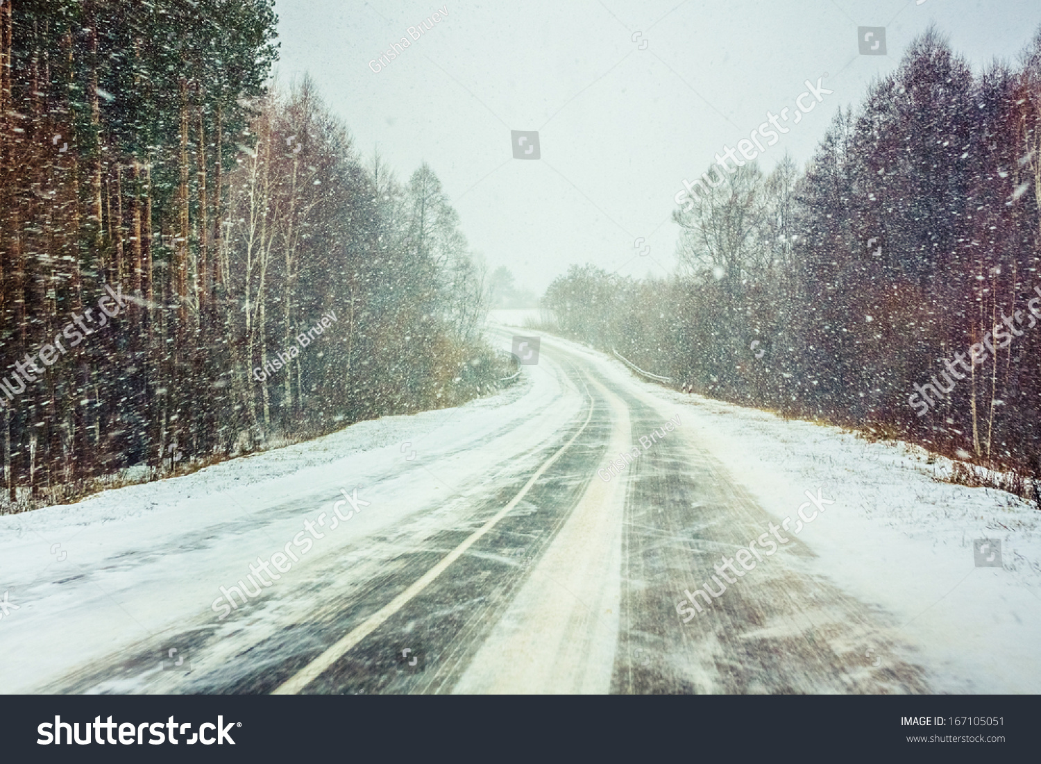 snowy-land-road-at-winter-adverse-weather-conditions-stock-photo