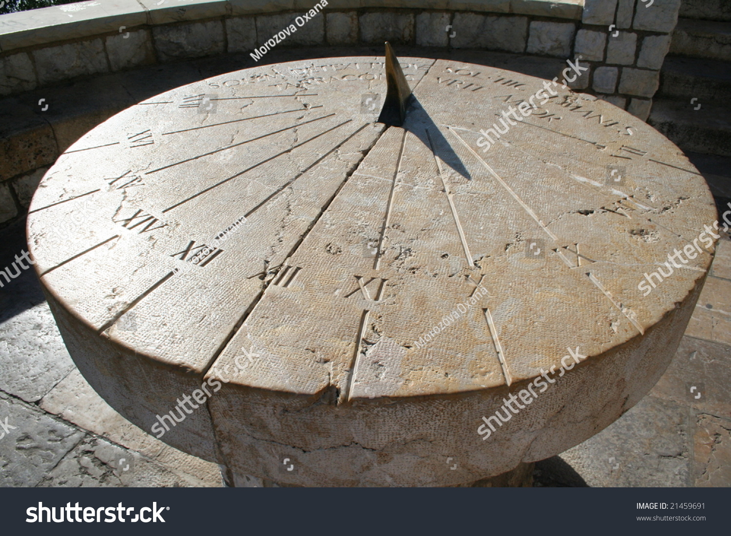 stock-photo-spain-tarragona-ancient-sundial-on-a-stone-platform-21459691.jpg
