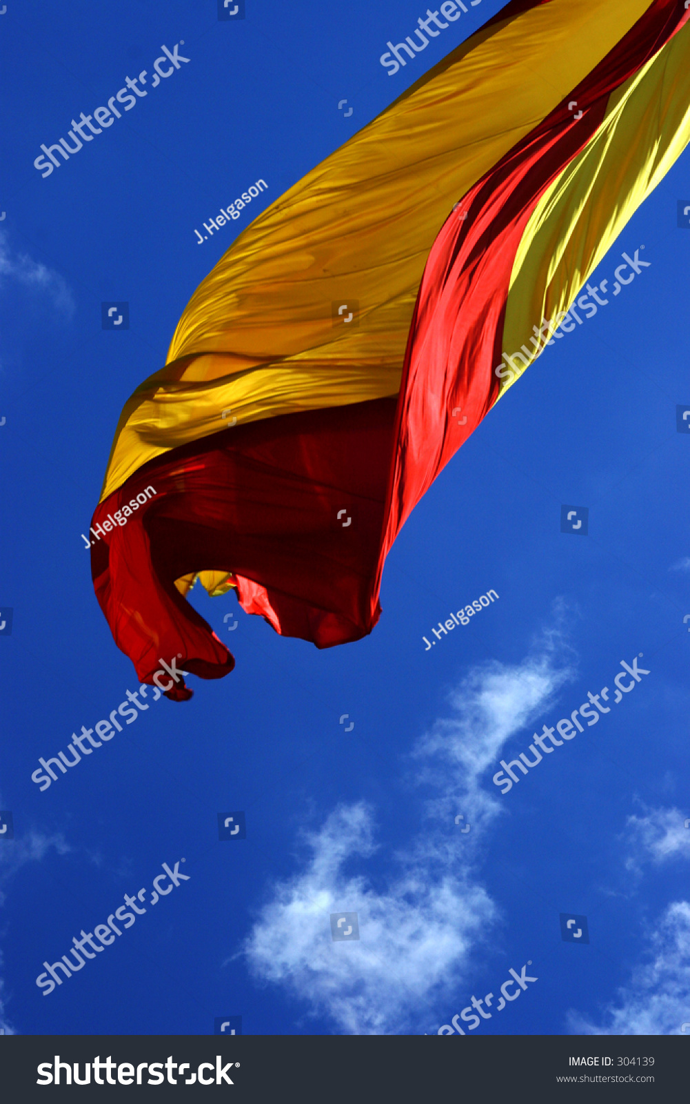 spanish-flag-in-the-wind-stock-photo-304139-shutterstock