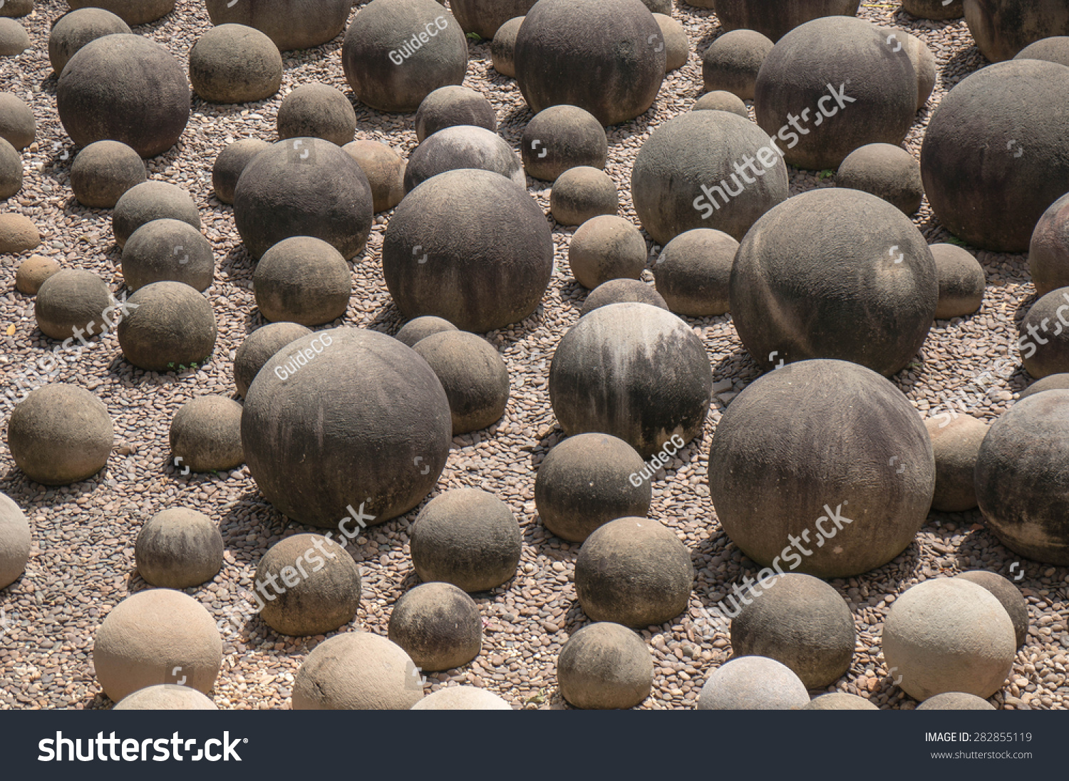 spherical-shape-of-rocks-on-the-ground-stock-photo-282855119-shutterstock