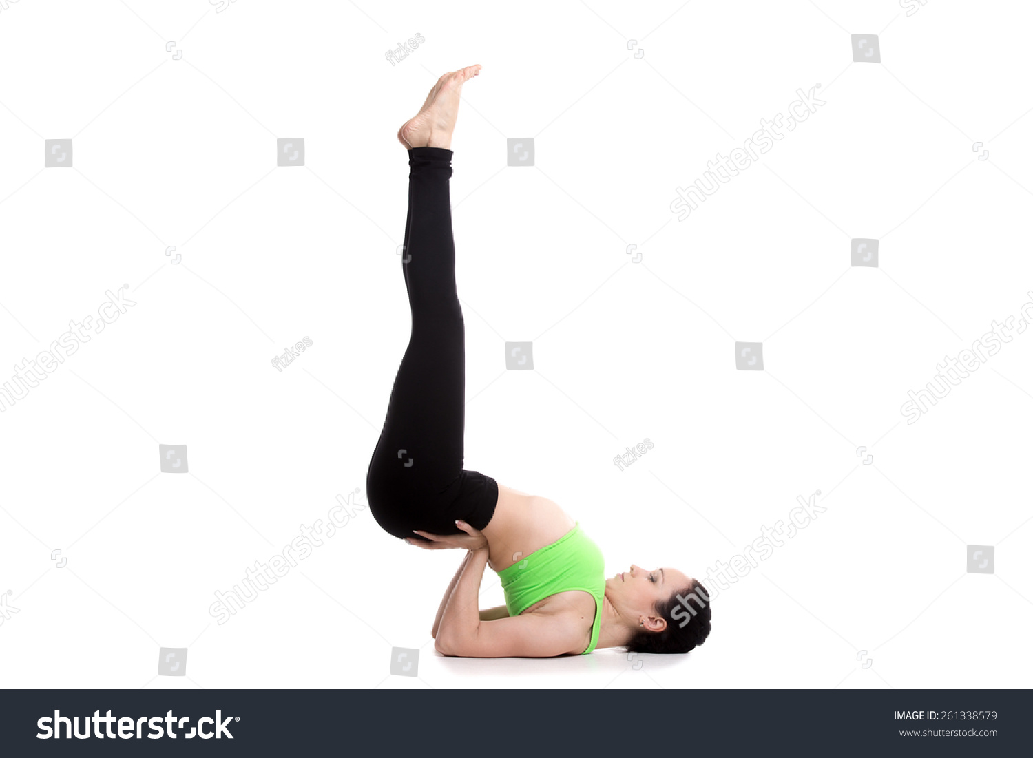 Sporty Girl On White Background Doing Shoulder Stand Exercise, Asana