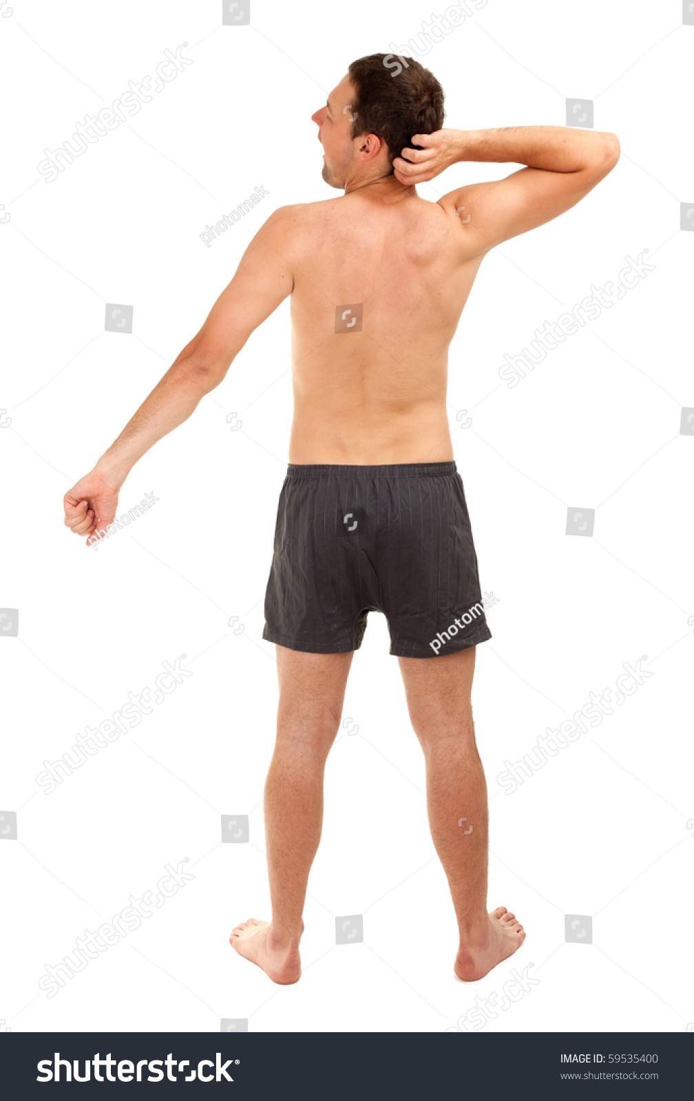 Standing Back Nude Man Yawning And Stretching Stock Photo Shutterstock