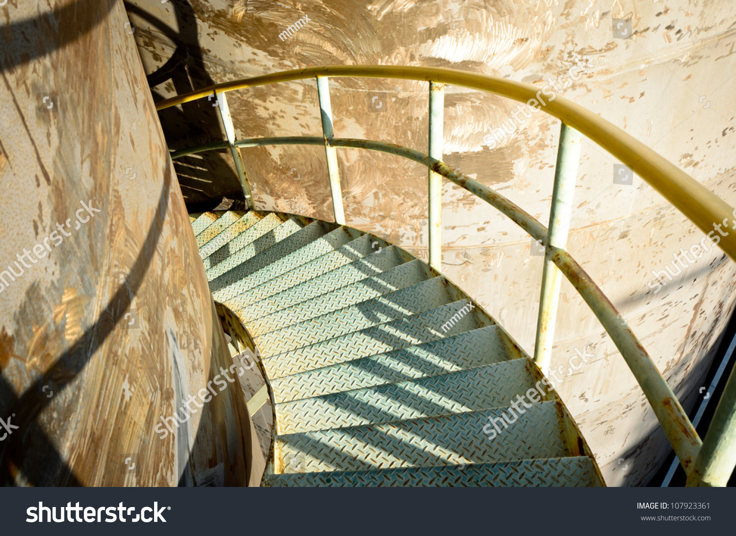 Steel Spiral Down Stairs On Storage Tank Stock Photo 107923361 