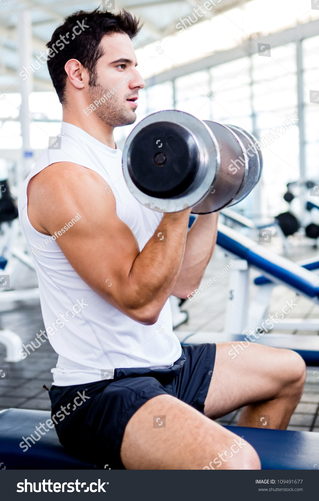 Strong Man At The Gym Lifting Heavy Weights Stock Photo 109491677