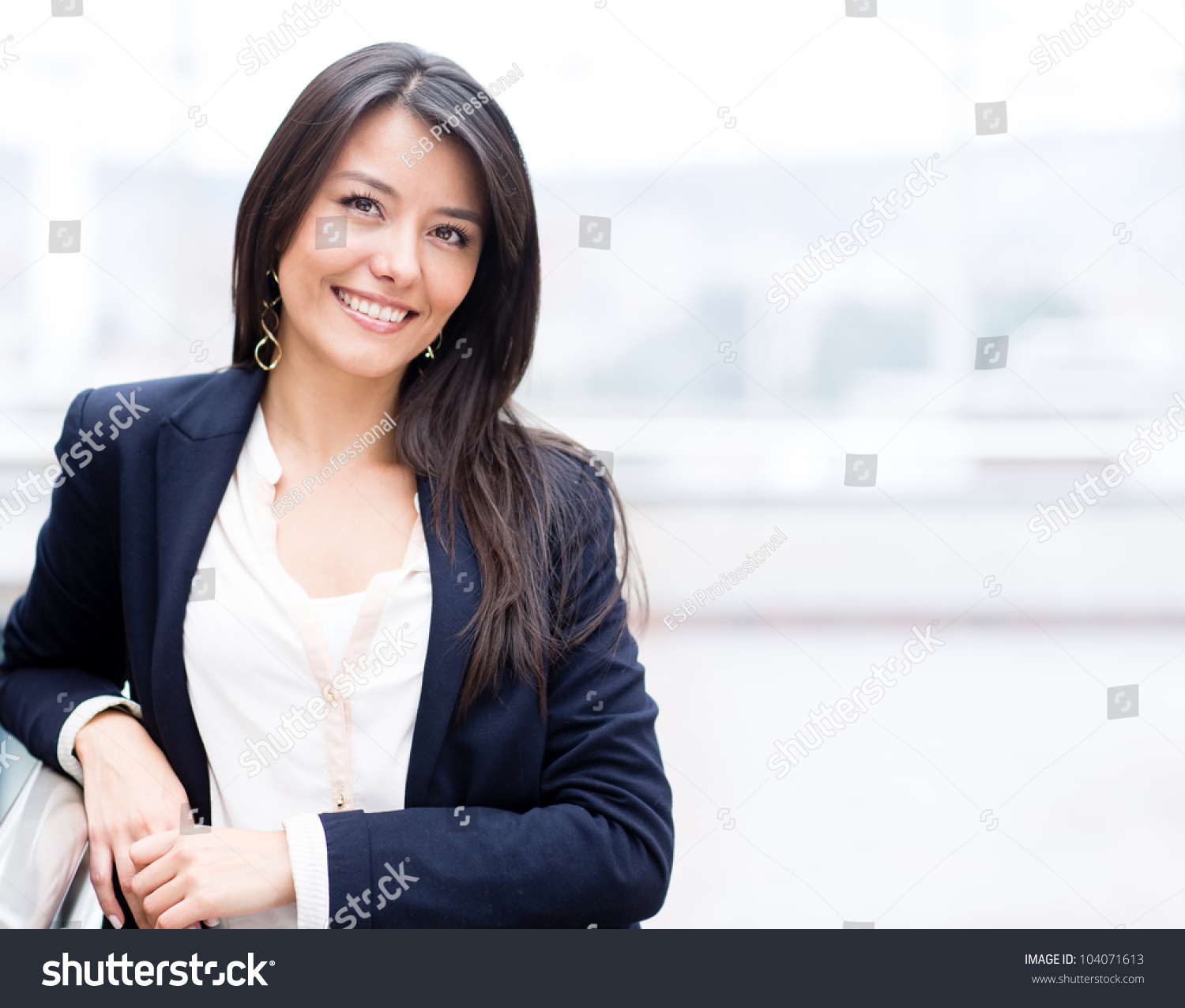 stock-photo-successful-business-woman-looking-confident-and-smiling-104071613.jpg