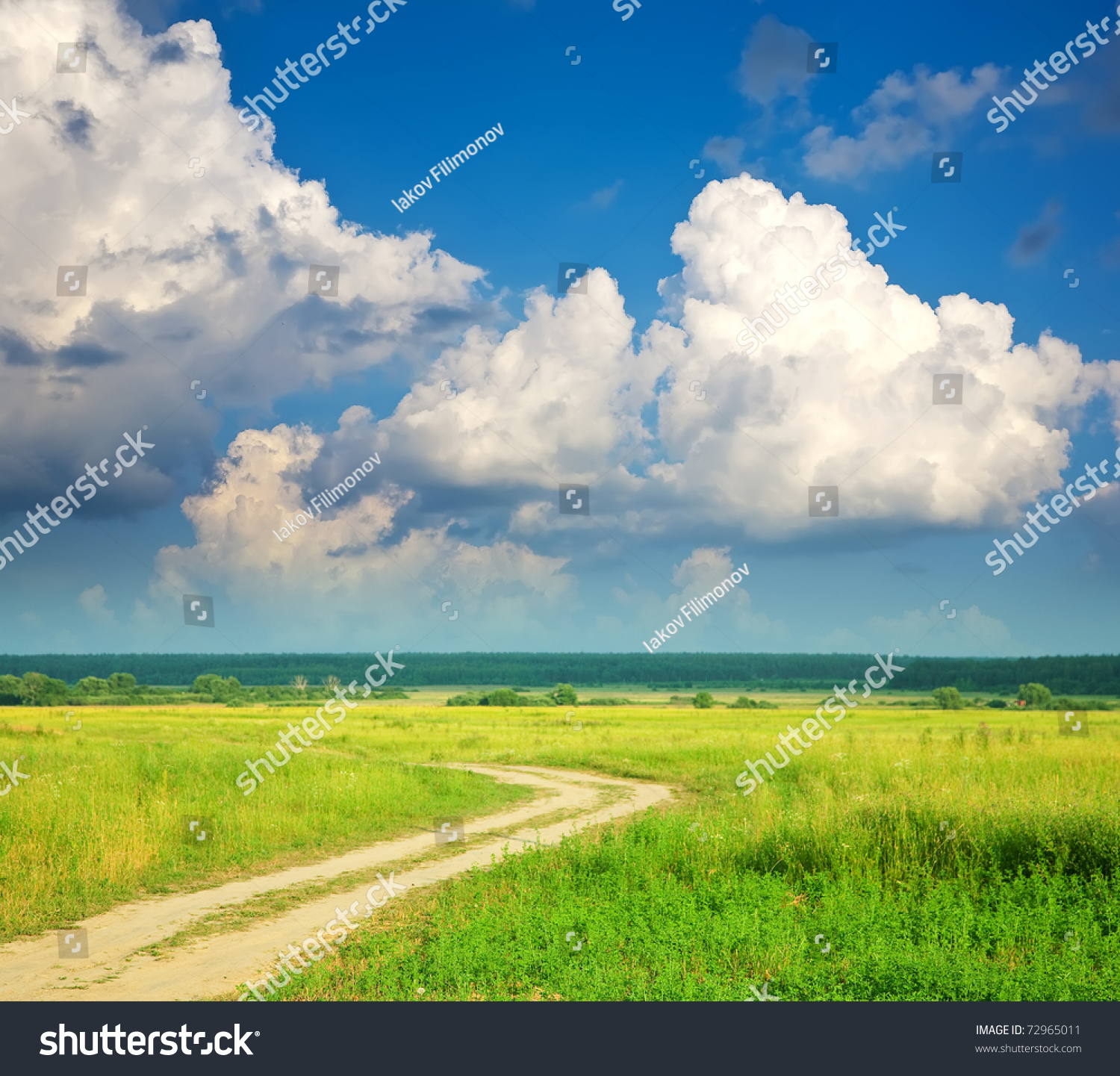 Summer Landscape With Road And Cloudy Sky Summer Landscape With Road And Cloudy Sky Stock Photo