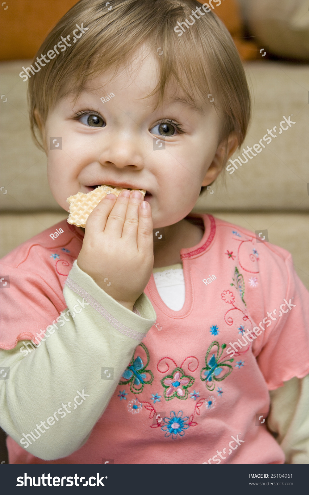 Sweet Young Baby Girl Eating Stock Photo 25104961 Shutt