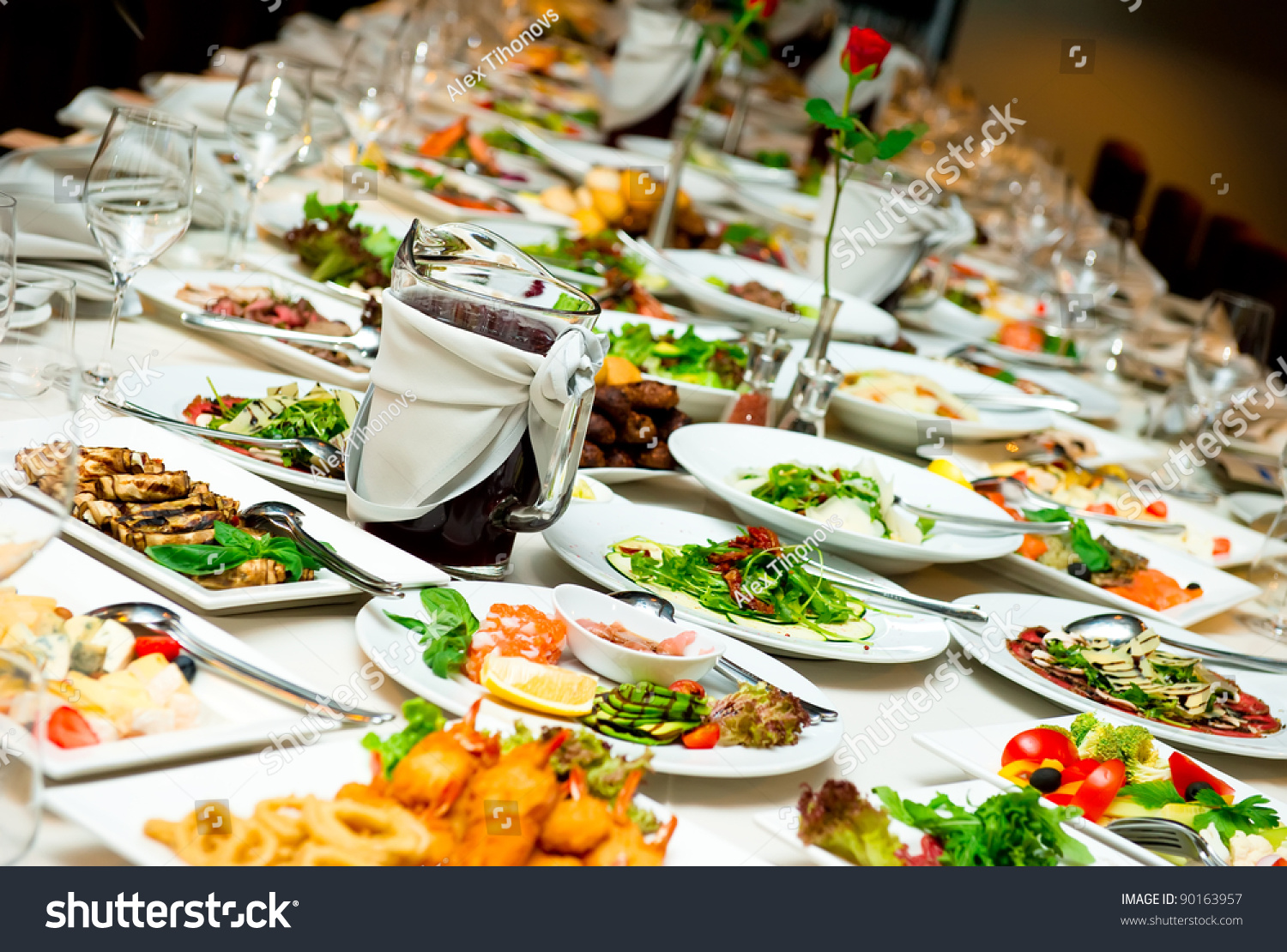 http://image.shutterstock.com/z/stock-photo-table-with-food-and-drink-90163957.jpg