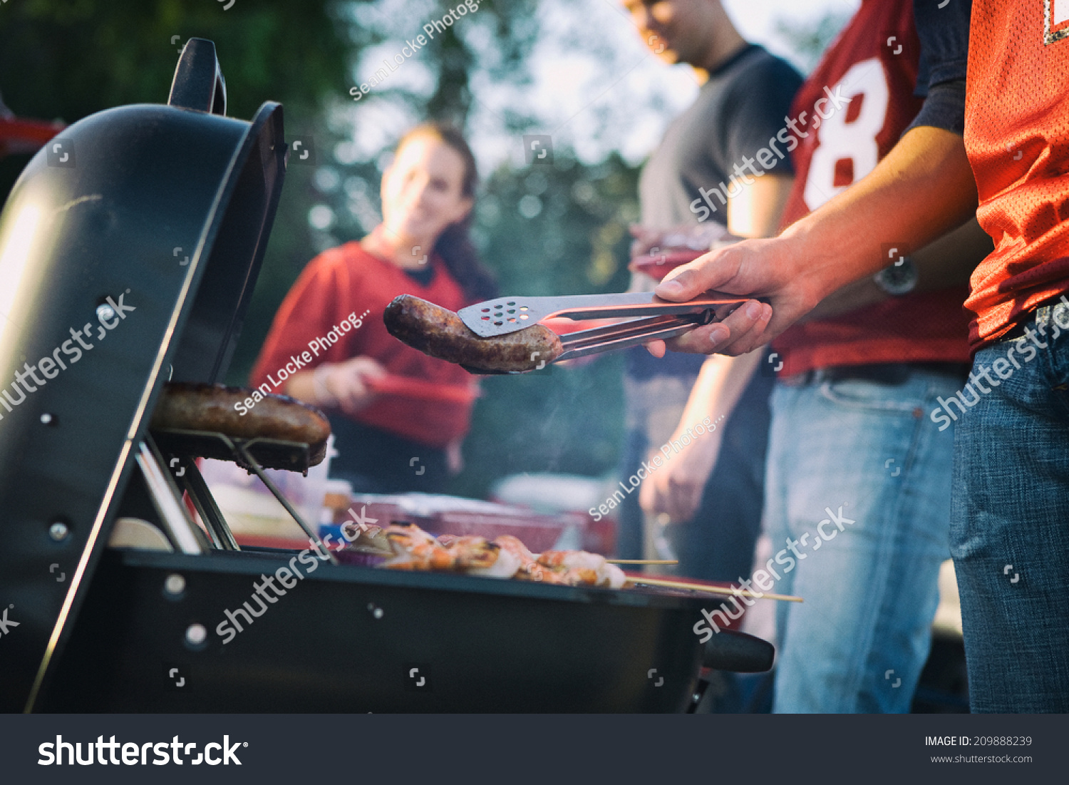 Tailgate Man Works The Grill At Tailgating Party Stock Photo 209888239