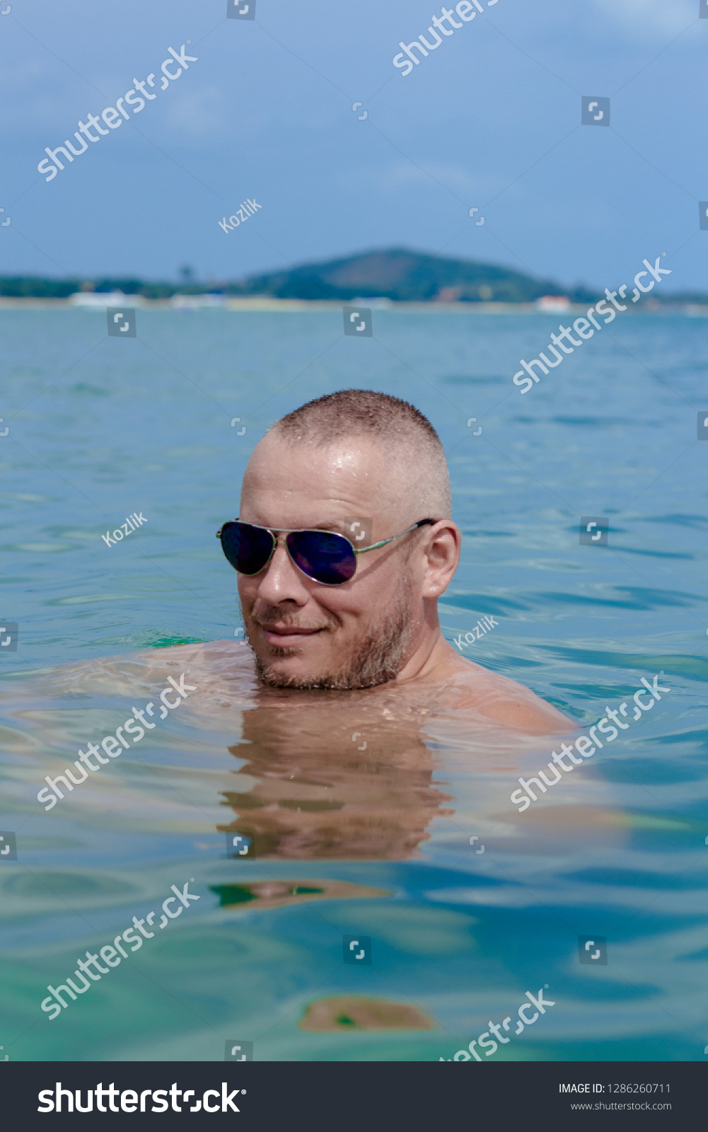 Tanned Man Nude Torso Sunglasses Posing Stock Photo