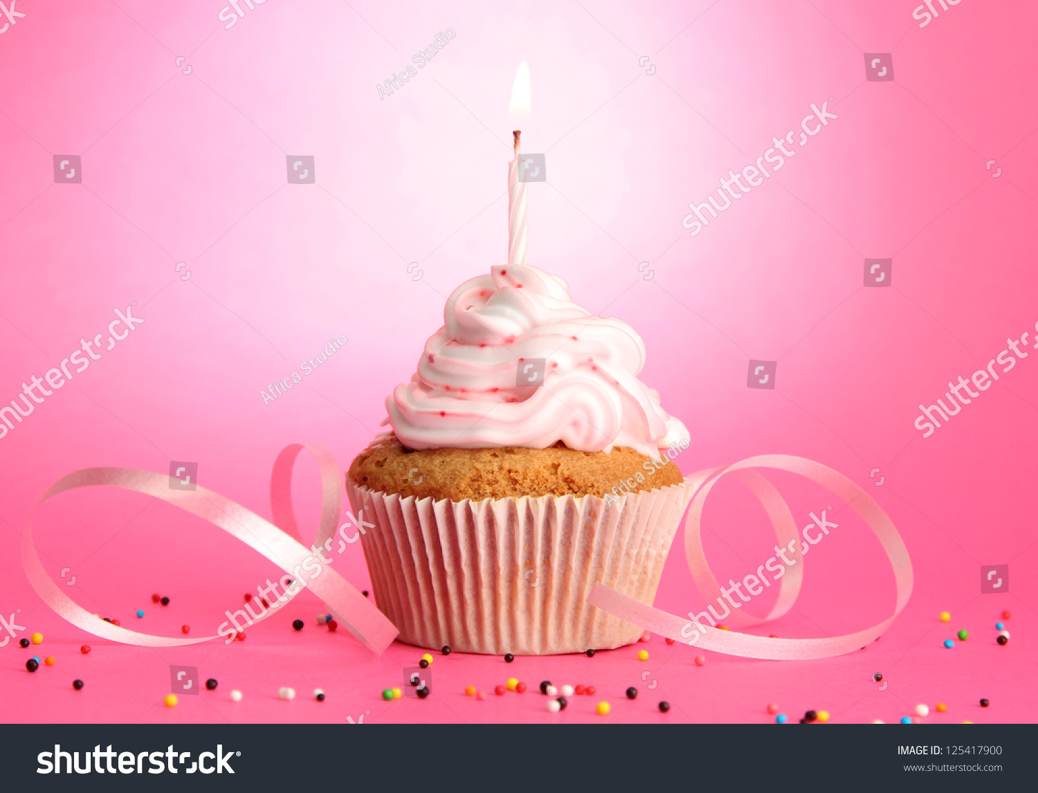 Tasty Birthday Cupcake With Candle, On Pink Background Stock Photo 